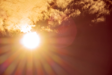 Blazing sun at high noon on a hot day