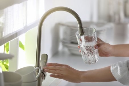 getting water from the faucet